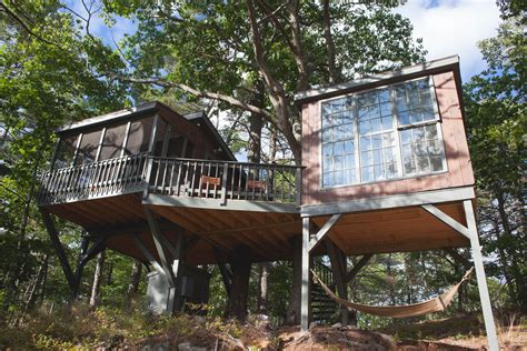 Escape the ordinary with a stay in a waterfront treehouse in a magical forest